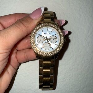 Gold Fossil Women’s Watch with Iridescent Face